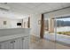 Open living room with sliding glass doors that offer a scenic view of the outdoors and natural light at 1126 Wedgefield Sw Dr, Marietta, GA 30064