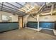 Unfinished basement with carpeted floors, painted walls and exposed ceiling, plus access to a utility area at 2191 Fairfield Se St, Smyrna, GA 30080