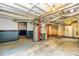 Basement utility area with exposed ductwork, water heater, and concrete flooring at 2191 Fairfield Se St, Smyrna, GA 30080