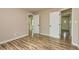 Bedroom featuring vinyl plank flooring, neutral walls, and white doors at 2191 Fairfield Se St, Smyrna, GA 30080