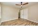 Bedroom with vinyl plank flooring, closet, and neutral colored walls at 2191 Fairfield Se St, Smyrna, GA 30080