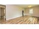 Spacious living room with wood floors, natural light, and neutral paint at 2191 Fairfield Se St, Smyrna, GA 30080