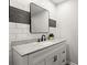 Stylish bathroom features a modern sink, vanity, and decorative wall tiles at 225 Lakeview W Rdg, Roswell, GA 30076