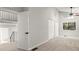 A bedroom with carpet, closets, a ceiling fan, and a window with natural light at 225 Lakeview W Rdg, Roswell, GA 30076