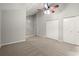 Bedroom featuring carpet, high ceilings, a ceiling fan, and a closet at 225 Lakeview W Rdg, Roswell, GA 30076