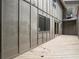 Exterior view of a wooden deck of a home with wall paneling at 225 Lakeview W Rdg, Roswell, GA 30076
