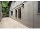 Home exterior featuring a wooden deck, a glass door, and wall paneling at 225 Lakeview W Rdg, Roswell, GA 30076