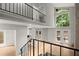 Bright foyer with open staircase and views to the outdoors at 225 Lakeview W Rdg, Roswell, GA 30076