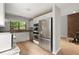 Updated kitchen with stainless steel appliances and wood flooring at 225 Lakeview W Rdg, Roswell, GA 30076
