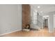 Living room featuring a cozy brick fireplace and a staircase at 225 Lakeview W Rdg, Roswell, GA 30076
