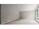 Bright living room with large windows and neutral carpet at 225 Lakeview W Rdg, Roswell, GA 30076