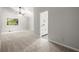 Spacious main bedroom with vaulted ceiling, ceiling fan, and ensuite bathroom entrance at 225 Lakeview W Rdg, Roswell, GA 30076