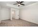 Bedroom with carpet and doorway to basement at 3473 Shoal Oak Ct, Riverdale, GA 30296