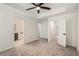 Bedroom with carpet and open doorway at 3473 Shoal Oak Ct, Riverdale, GA 30296