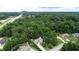 Lovely aerial view of a home nestled in lush greenery near a road at 107 Sedgefield Overlook, Dallas, GA 30157