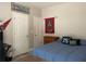 Bedroom featuring twin bed, sporty decor, closet and natural light at 107 Sedgefield Overlook, Dallas, GA 30157