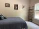 Bedroom with a double bed, shelving, and posters at 107 Sedgefield Overlook, Dallas, GA 30157