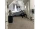 Cozy bedroom features carpeted floor, a window and plush bedding, making for a comfortable retreat at 107 Sedgefield Overlook, Dallas, GA 30157