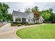 Charming clubhouse with welcoming entrance and landscaped surroundings in a serene community setting at 107 Sedgefield Overlook, Dallas, GA 30157