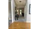 Inviting foyer with hardwood floors transitioning to plush carpet, leading to a cozy living space at 107 Sedgefield Overlook, Dallas, GA 30157