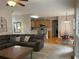 Cozy living room with comfortable seating, flowing seamlessly into the kitchen and dining area at 107 Sedgefield Overlook, Dallas, GA 30157