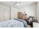 Well-lit bedroom featuring a ceiling fan, closet, and comfortable seating at 1717 N Decatur Ne Rd # 322, Atlanta, GA 30307