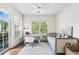 Sunlit bedroom features a ceiling fan, desk, and comfortable daybed for relaxation at 1717 N Decatur Ne Rd # 322, Atlanta, GA 30307