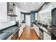 Bright kitchen showcases white cabinets, granite countertops, and stainless steel appliances at 1717 N Decatur Ne Rd # 322, Atlanta, GA 30307