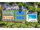 Aerial shot featuring a playground, basketball court, tennis courts, and swimming pool at 5882 Grandview Nw Ct, Acworth, GA 30101