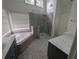 Bathroom offers separate shower and large tub at 5882 Grandview Nw Ct, Acworth, GA 30101