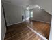 Attic bedroom with wood-look flooring and angled walls at 5882 Grandview Nw Ct, Acworth, GA 30101