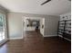 Open living room showing hardwood floors and access to the kitchen area at 5882 Grandview Nw Ct, Acworth, GA 30101
