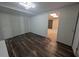 Room featuring wood floors and two closets at 5882 Grandview Nw Ct, Acworth, GA 30101