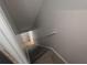 Carpeted stairs lead to another level of the home at 5882 Grandview Nw Ct, Acworth, GA 30101