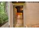 Unfinished basement entrance showing outdoor access and bare floors at 749 Dogwood Dr, Lawrenceville, GA 30046