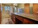 Bathroom with tile, double sinks, a bathtub, and a toilet at 749 Dogwood Dr, Lawrenceville, GA 30046