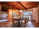 Cozy dining room with hardwood ceilings, large windows, and chandelier lighting at 749 Dogwood Dr, Lawrenceville, GA 30046