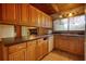 Charming kitchen with wooden cabinets, solid countertops, and ample natural light at 749 Dogwood Dr, Lawrenceville, GA 30046