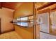 This kitchen features tile flooring and a refrigerator with a water dispenser at 749 Dogwood Dr, Lawrenceville, GA 30046