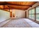 Spacious living room with hardwood ceilings and large windows letting in natural light at 749 Dogwood Dr, Lawrenceville, GA 30046