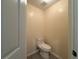 Small powder room with neutral walls and tile flooring at 1245 Mulberry Mill Ln, Lawrenceville, GA 30043