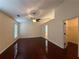 Bright bedroom featuring a ceiling fan, high ceilings, and access to a walk-in closet at 1245 Mulberry Mill Ln, Lawrenceville, GA 30043