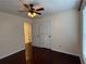 Bedroom with fan, lighting, and neutral walls at 1245 Mulberry Mill Ln, Lawrenceville, GA 30043