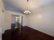 The formal dining room features elegant molding and a chandelier at 1245 Mulberry Mill Ln, Lawrenceville, GA 30043
