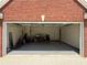 The open two-car garage is spacious with room for storage at 1245 Mulberry Mill Ln, Lawrenceville, GA 30043