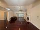 Spacious living room featuring hardwood floors, a fireplace, and ample natural light at 1245 Mulberry Mill Ln, Lawrenceville, GA 30043