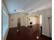 Spacious living room featuring hardwood floors, recessed lighting, and neutral walls at 1245 Mulberry Mill Ln, Lawrenceville, GA 30043