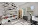 Well-organized walk-in closet with ample shelving for shoes and storage at 125 Climbing Ivy Cir, Fayetteville, GA 30214