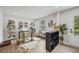 A spacious office with a workstation, natural light, and a cozy decor at 125 Climbing Ivy Cir, Fayetteville, GA 30214