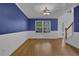Open-concept dining room with natural light, connecting to the entry and other living areas at 1387 Sw Haynes Meadow Trl, Grayson, GA 30017